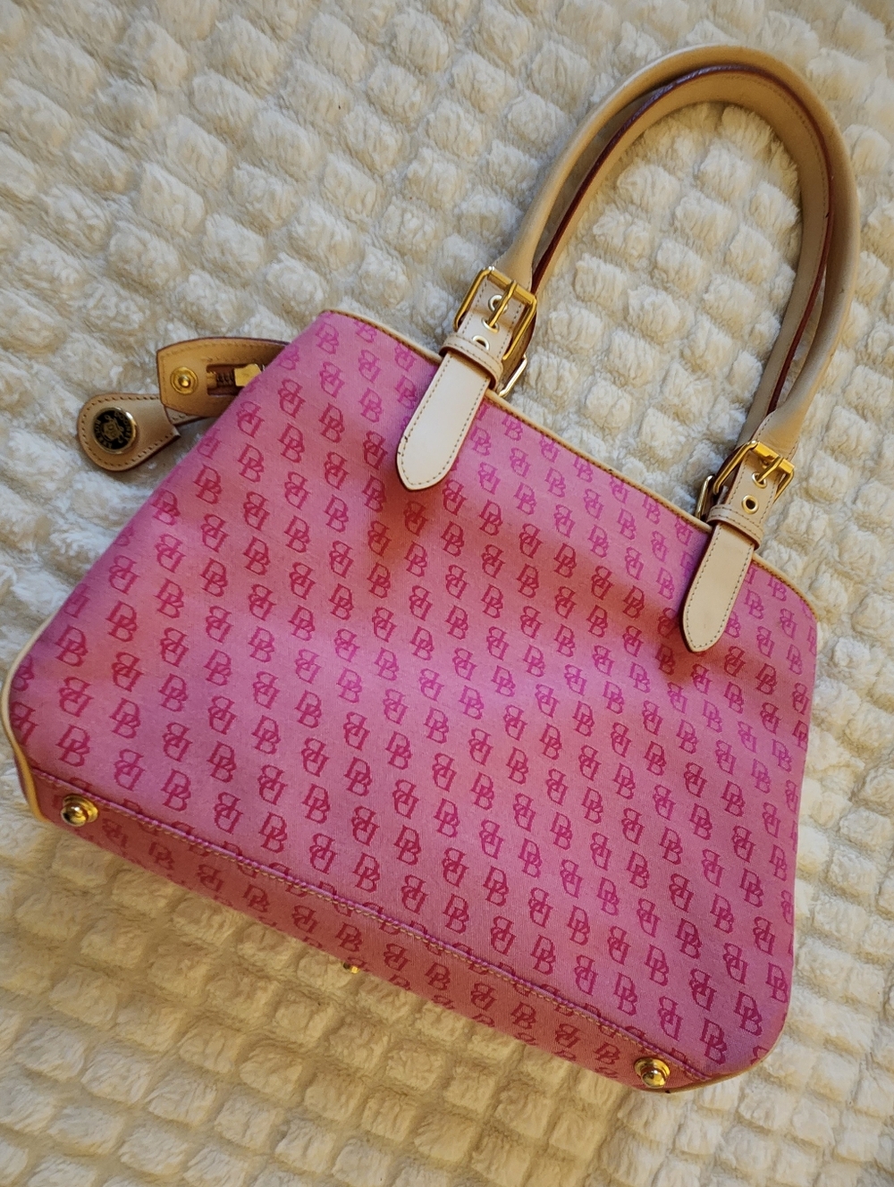 Pink Patterned Dooney & Bourke Handbag with Cream Handles